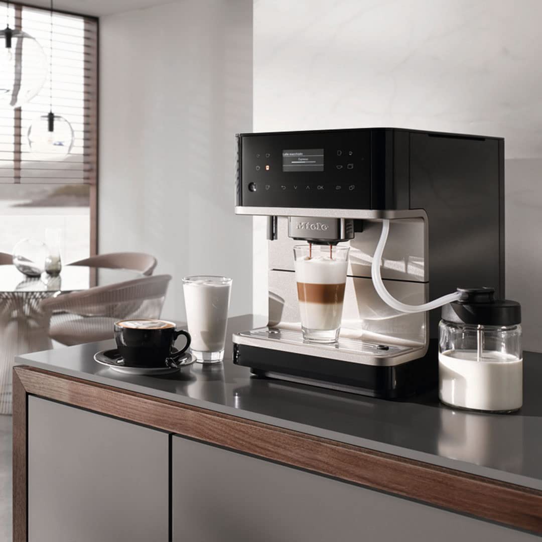 https://s3-assets.quenchessentials.com/media/images/products/miele-cm6360-milkperfection-countertop-espresso-machine-obsidian-black-lifestyle.jpg